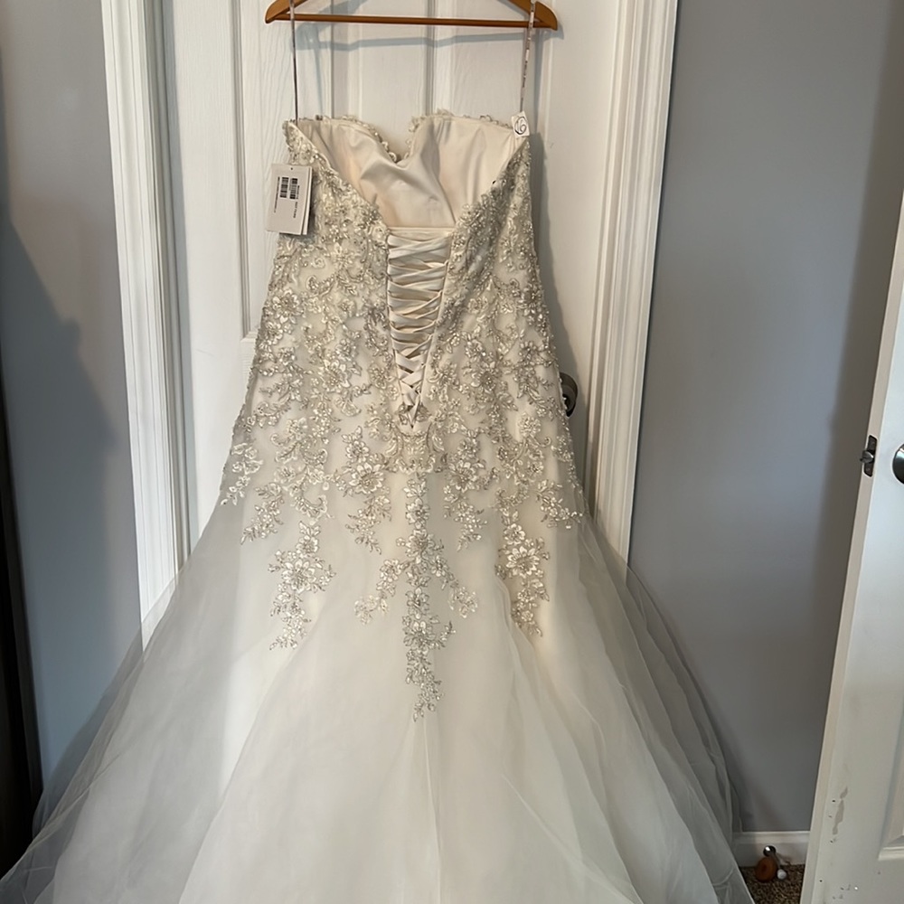 Maggie Sottero Ivory Ball Gown with Silver Beaded Bodice - Picture 3 of 11